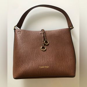 Calvin Klein Leather Bucket Handbag. With removable leather pouch.